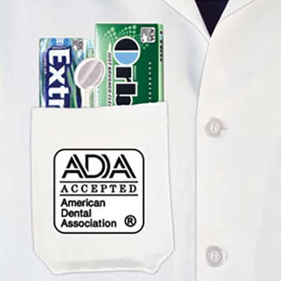 Extra® and Orbit® sugar-free gum inside a dentist white coat pocket that has A D A Accepted logo.