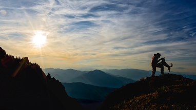 Man with dog on a mountain